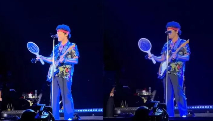 Após quase engolir mosquito, Bruno Mars usa raquete elétrica para evitar insetos em show no Brasil